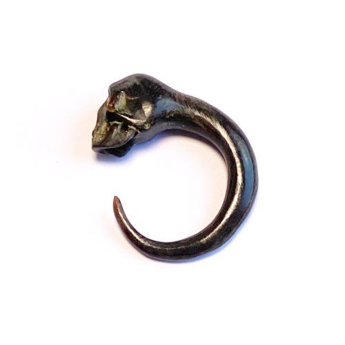 Dilatador de hueso con una calavera