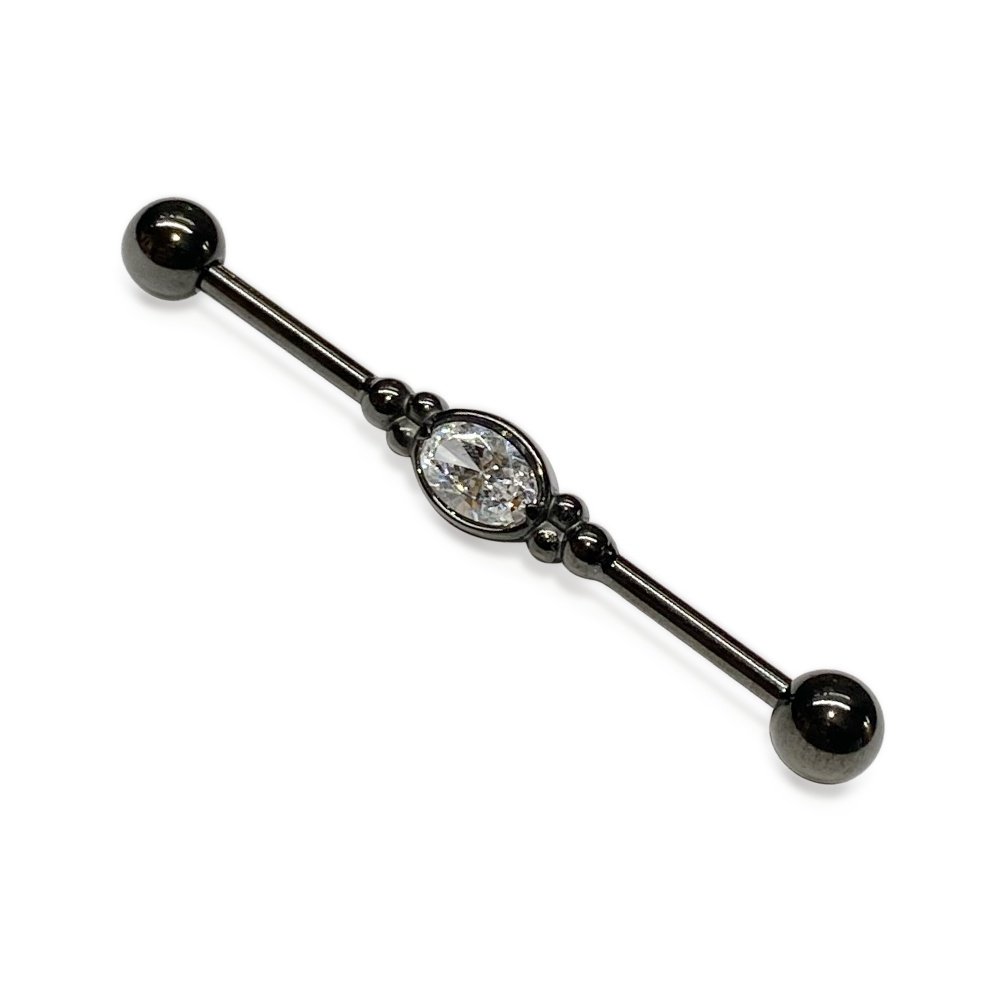 Piercing industrial negro con circonia ovalada ZUK Lleida