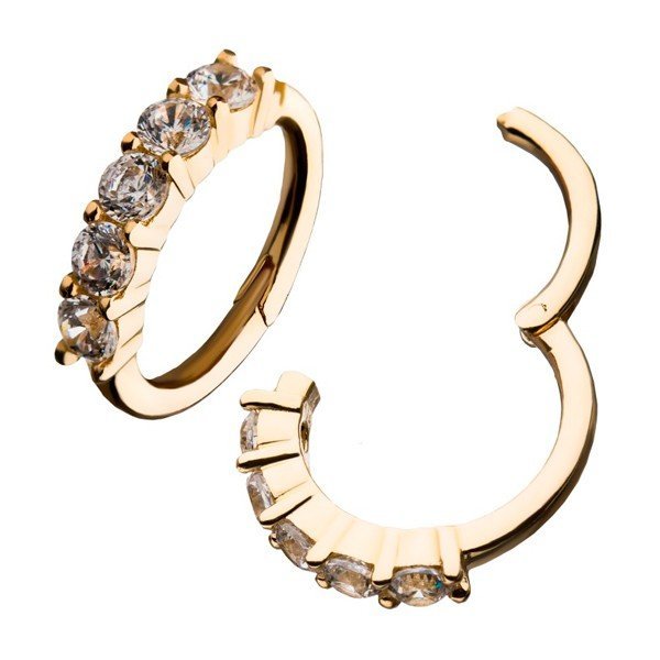 Aro de oro macizo de 14 Kt. con 5 Zirconias