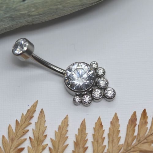 Piercing de ombligo con 9 zirconias
