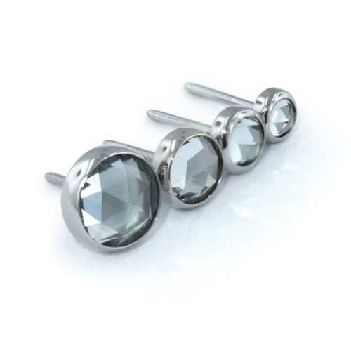 Piercing de titanio con 1 topacio blanco