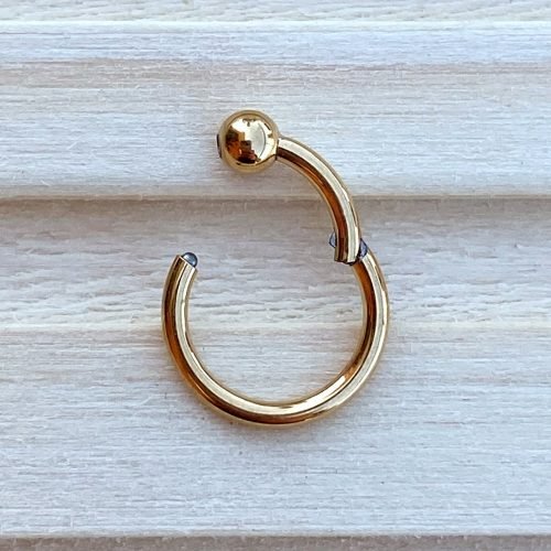 Alternative view of Clicker de titanio y baño de oro 24 Kt. con una bola