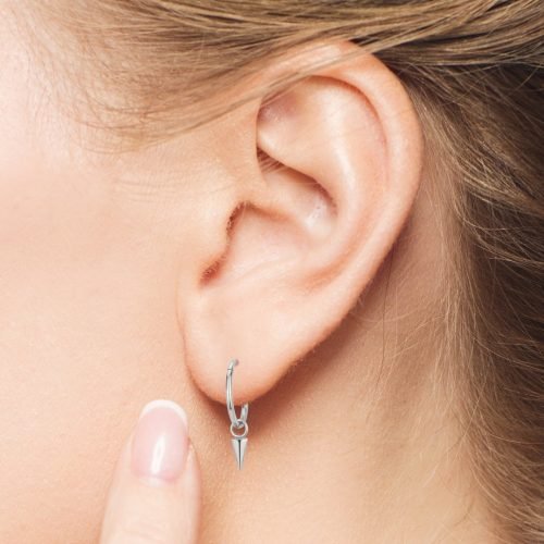 Alternative view of Clicker de titanio con un pincho