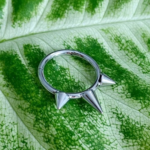 Clicker de titanio con tres pinchos