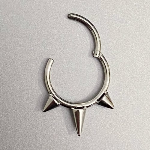 Alternative view of Clicker de titanio con tres pinchos