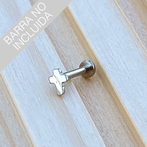 Top de titanio con forma de cruz