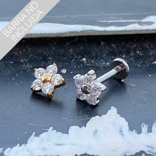 Top de titanio con forma de flor y zirconias