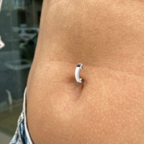 Alternative view of Clicker de ombligo de titanio